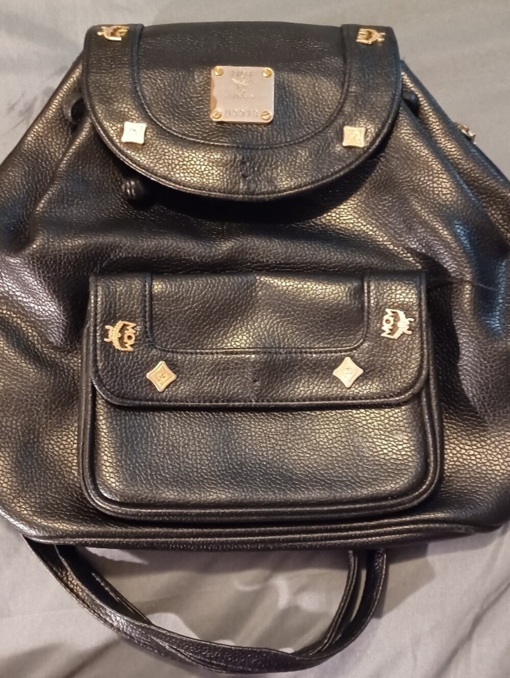 Vintage MCM Black Pebble Leather Backpack With Plaque & Studed Front.